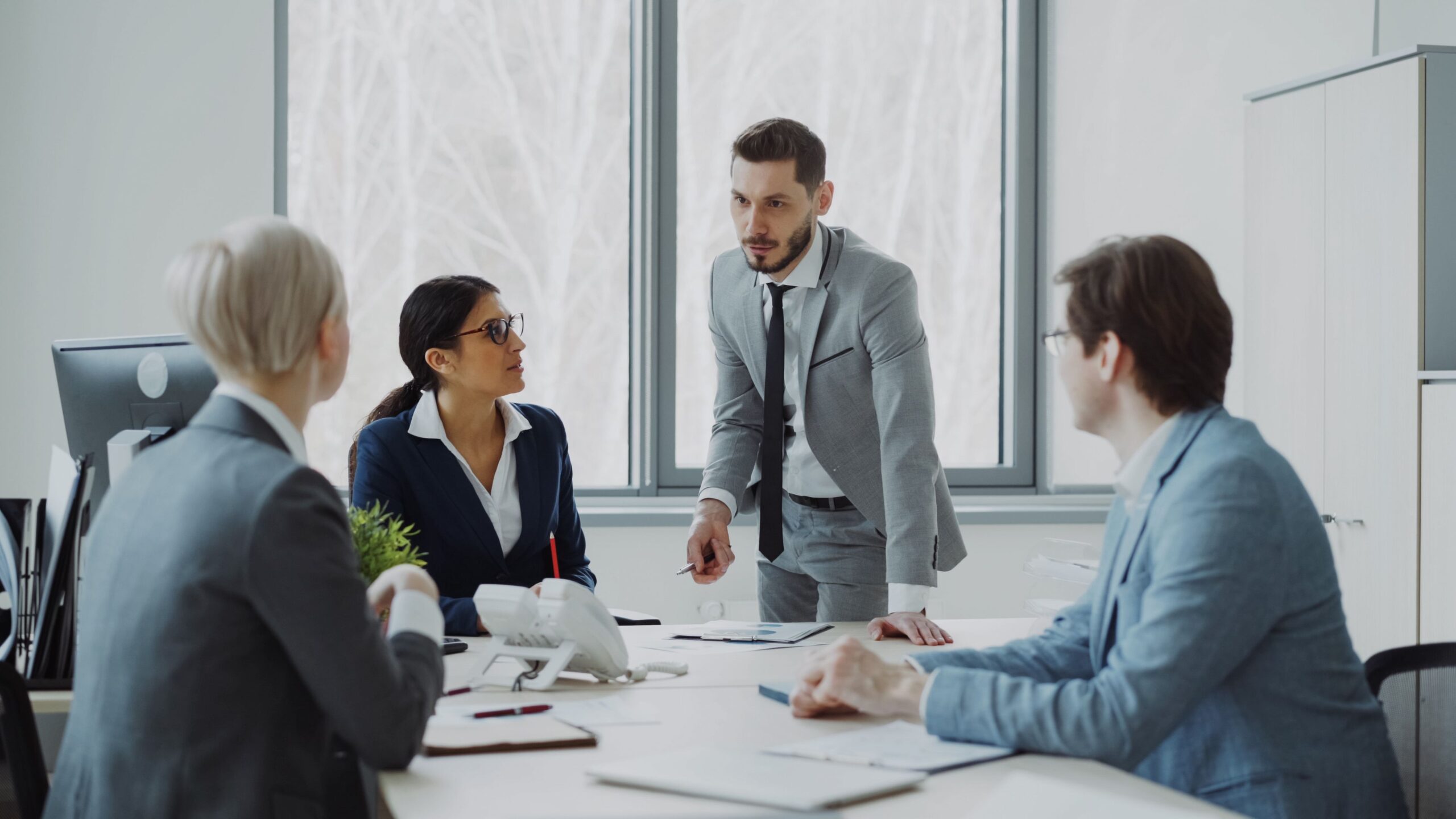 Team members building trust through collaboration and supportive workplace leadership